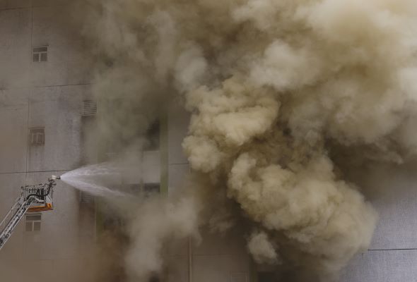Thousands evacuated as fire hits warehouse in crowded Hong Kong district