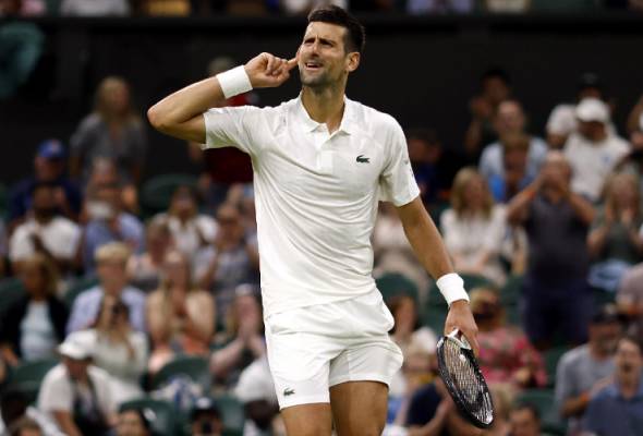 Tennis - Djokovic relieved to survive Rublev dogfight