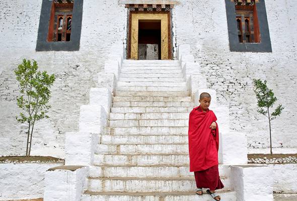 Bhutan cuts daily tourist fee by half to lure more visitors