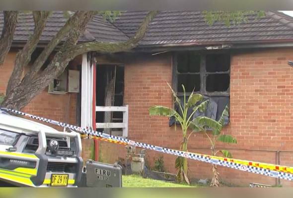 Australia police charge man with murder after Sydney house fire kills three children