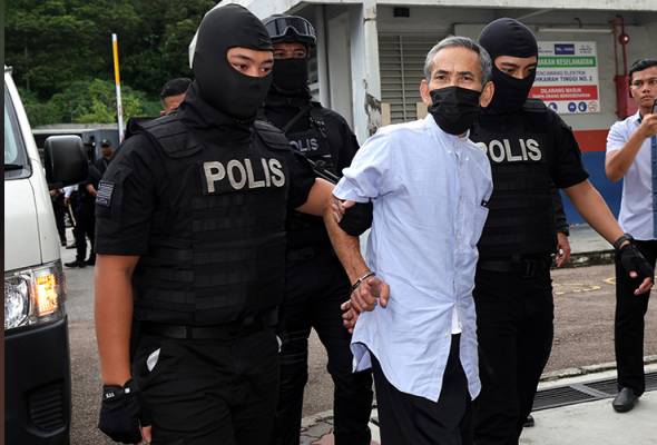 Former lecturer charged with promoting terrorist acts