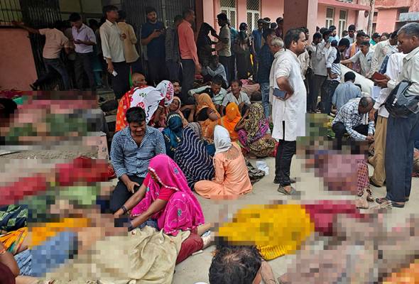At least 121 people, mostly women, killed in stampede at India's Hathras