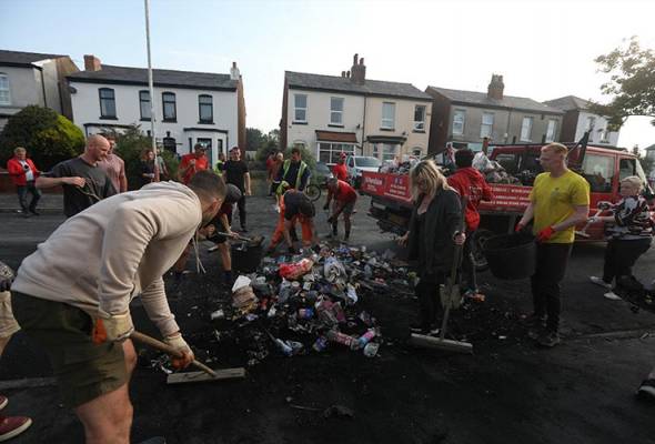 UK charges 17-year-old with murder in Southport killings as demonstrations continue