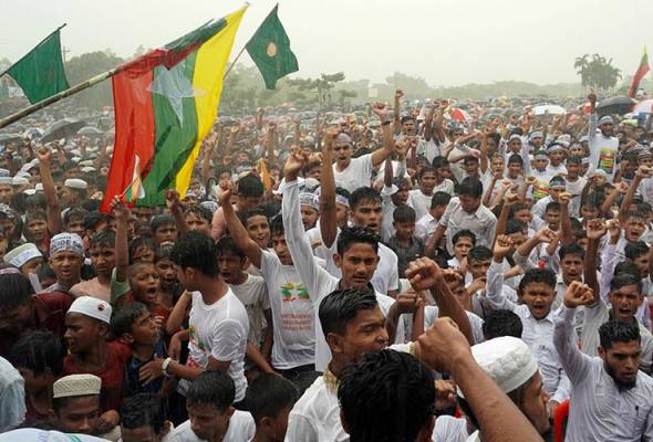 Thousands of Rohingya flee to Bangladesh from violence in Myanmar, official says