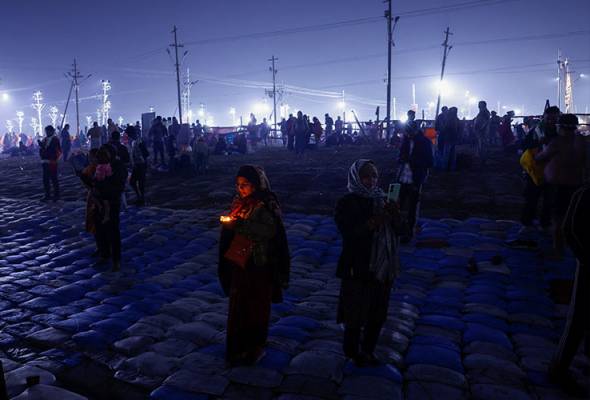 India's Maha Kumbh festival sees 15 million people take holy dip on first day