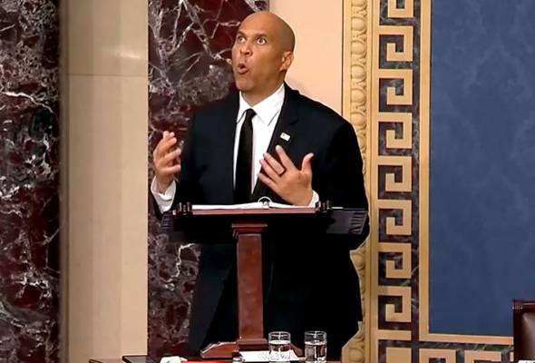 Democratic US Senator Booker takes on Trump in record-breaking speech