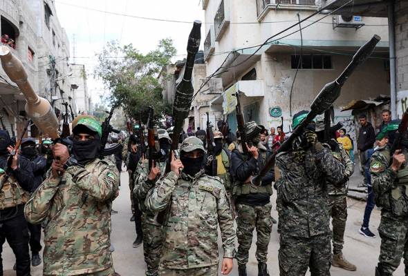 INSIGHT - Battling to survive, Hamas faces defiant clans and doubts over Iran