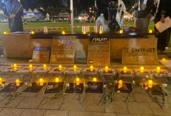 Wartawan dibunuh Israel dikenang, suasana suram selubungi Dataran Merdeka