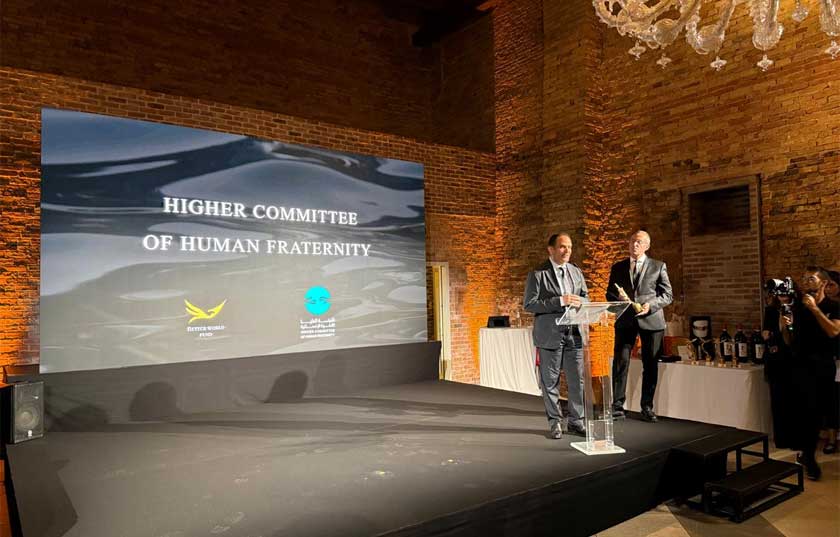 Man accepting award at an event