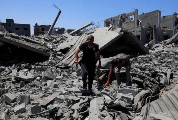 Hamas hands over hostage bodies after Israel threatens aid cut