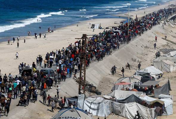 Gazans return to wrecked homes as Israeli forces pull back under ceasefire