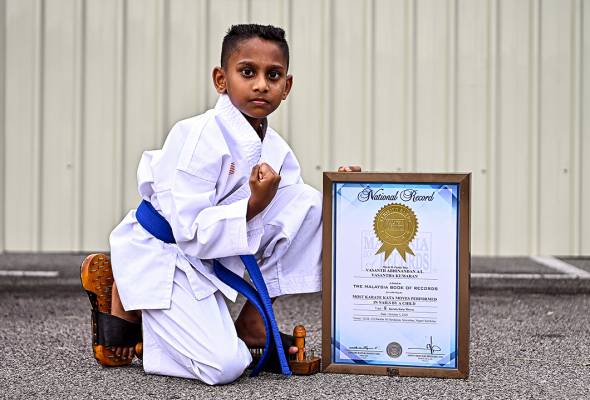 Murid tahun dua cipta rekod MBR lakukan Karate Kata pakai 'kasut berpaku'